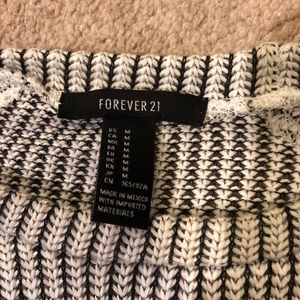 Cropped black and white herringbone sweater